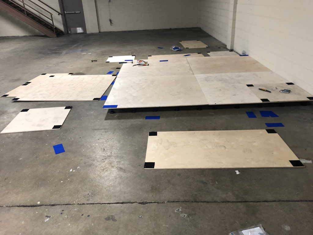 Floor panels and supports arranged during construction.